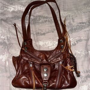 Botkier leather purse with fringe details